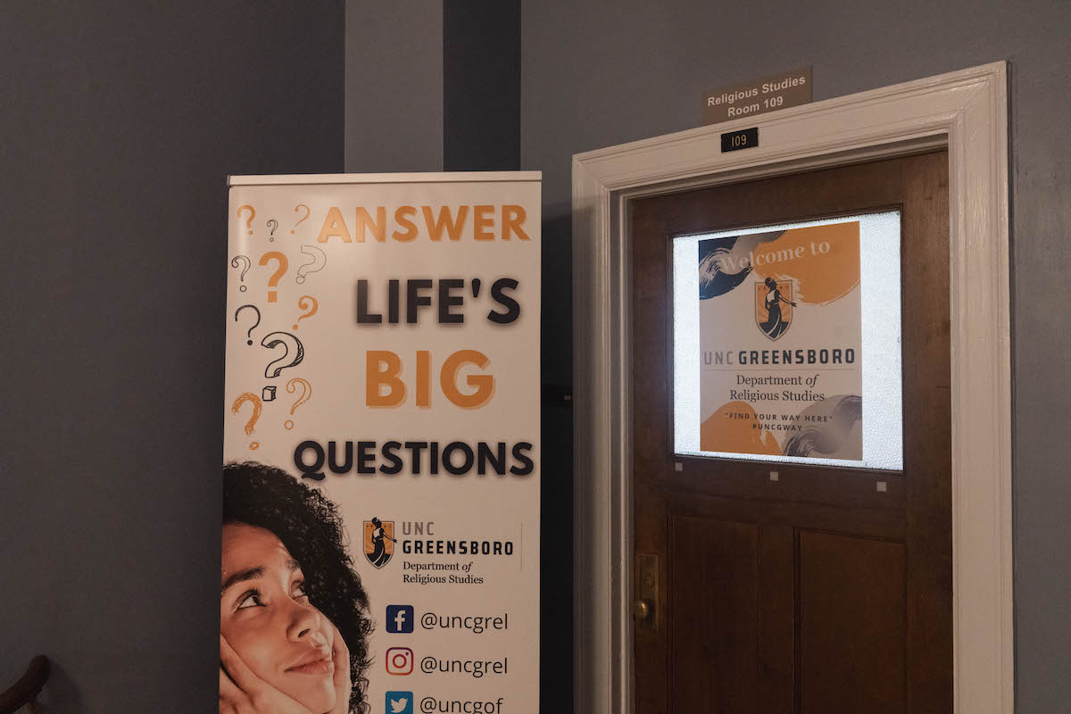 a sign outside the religious studies department about "Life's Big Questions"