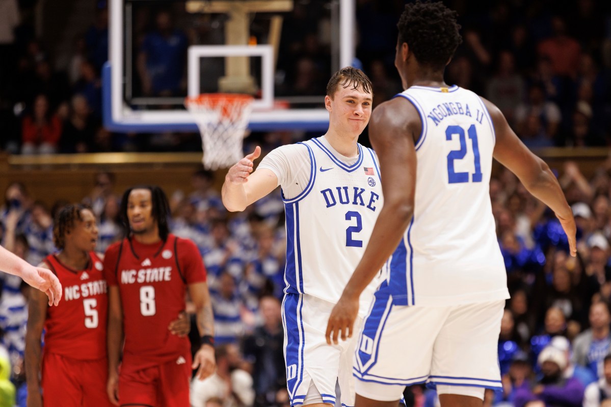 duke player goes for a high-five